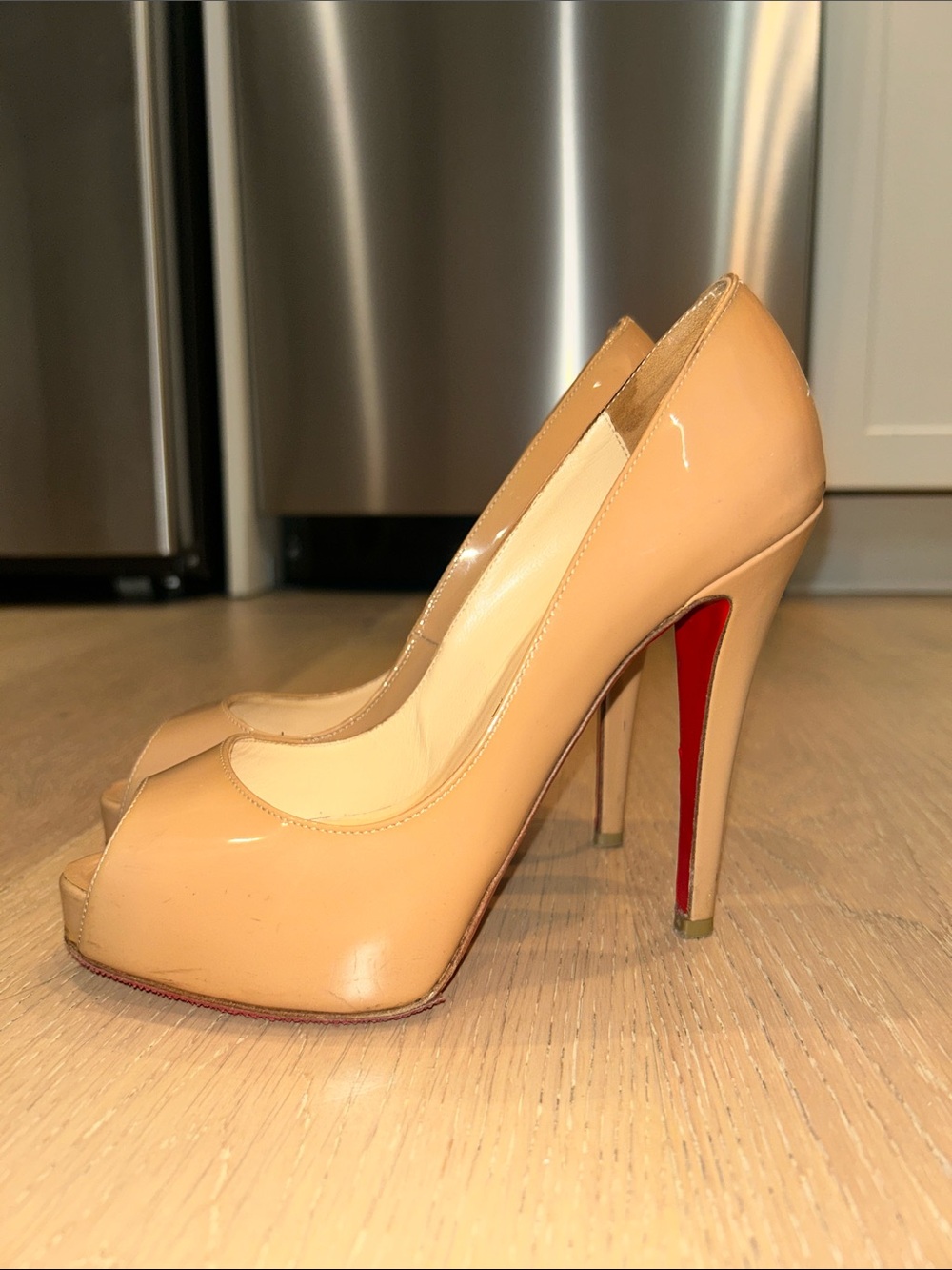 Christian Louboutin Nude Patent Peep-Toe Pumps with Red Soles